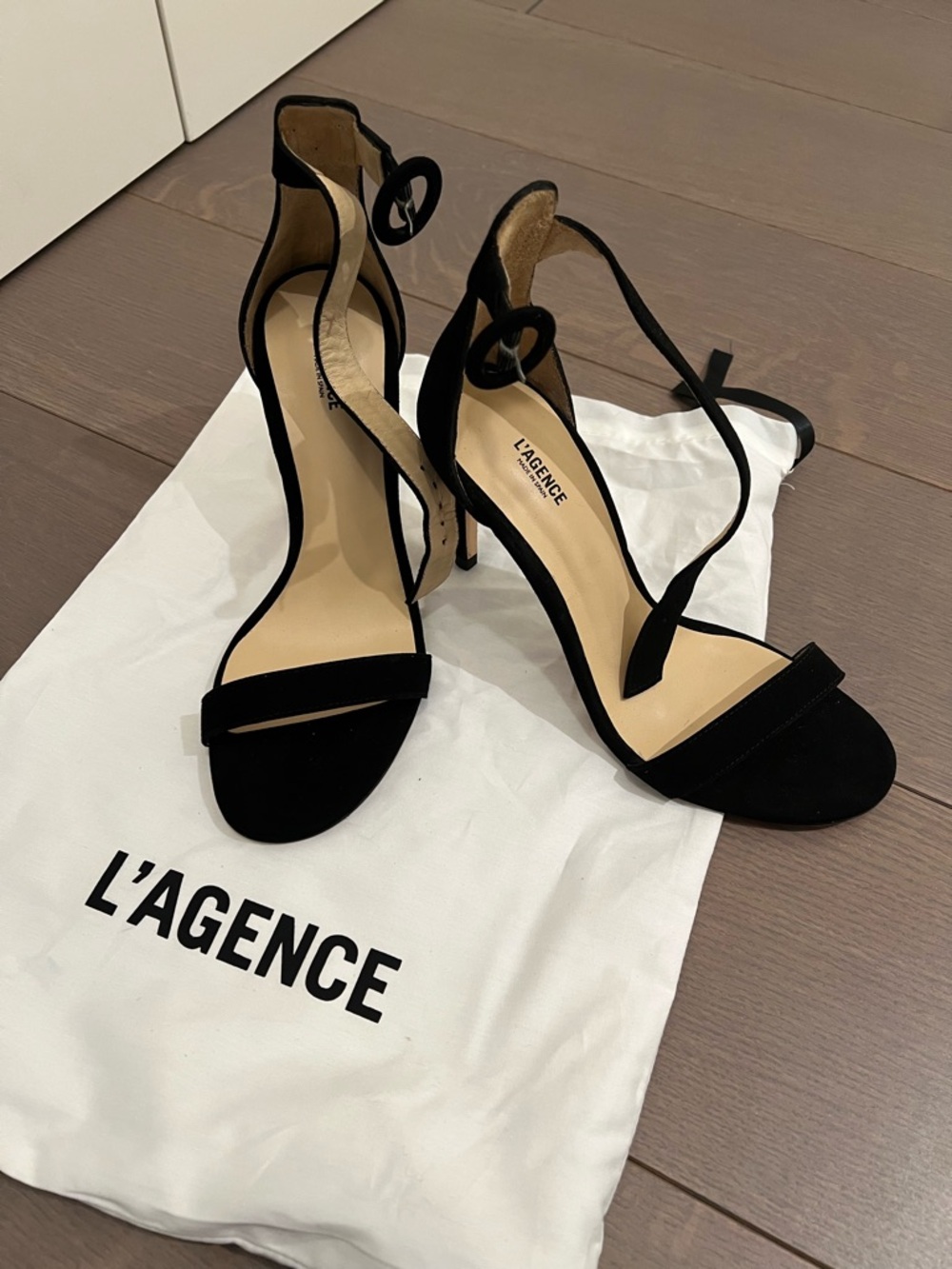 L'AGENCE Black Suede Ankle-Strap Stiletto Sandals with Circle Buckle